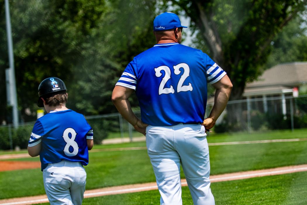 River Sherrill helping dad, Chase, coach 3rd base on Father’s Day. Photo by Peterman Sports Photography stevepeterman5@gmail.com