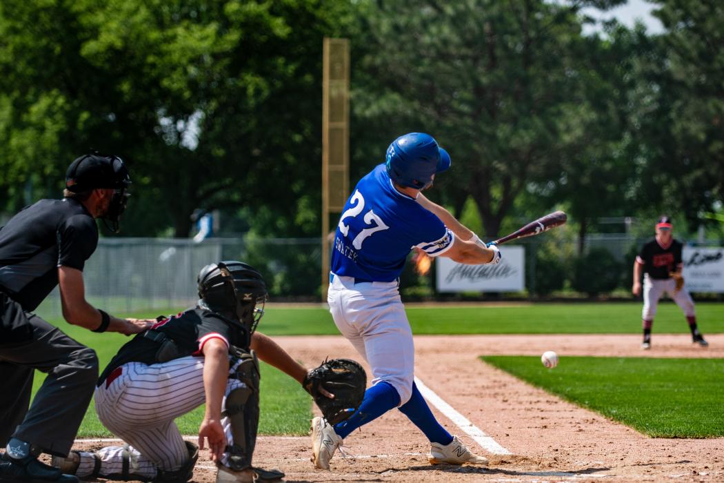 Ben Swatek makes a base hit. Photo by Peterman Sports Photography • stevepeterman5@gmail.com