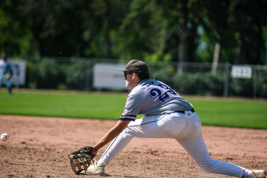 Brendan Barnett stretches to get the out at first base against Flandreau. Photo by Peterman Sports Photography • stevepeterman5@gmail.com