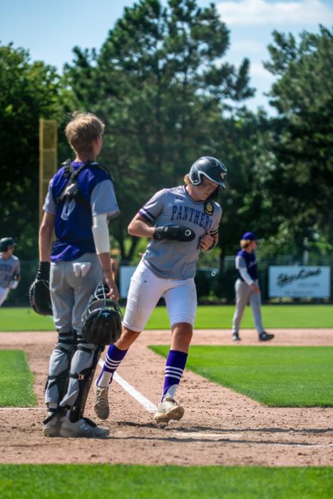 Jaxon Hennies scores a run for Dakota Valley. Photo by Peterman Sports Photography stevepeterman5@gmail.com