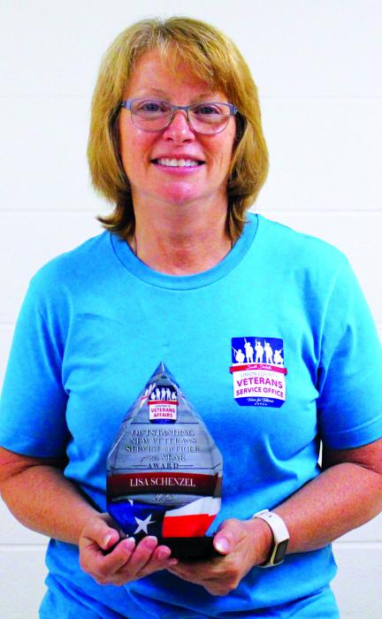 Union County Veteran Services Officer Lisa Schenzel holds the award she received as New Veteran Services Officer of the Year. Photo by Beth Hutcheson • times1reporter@gmail.com