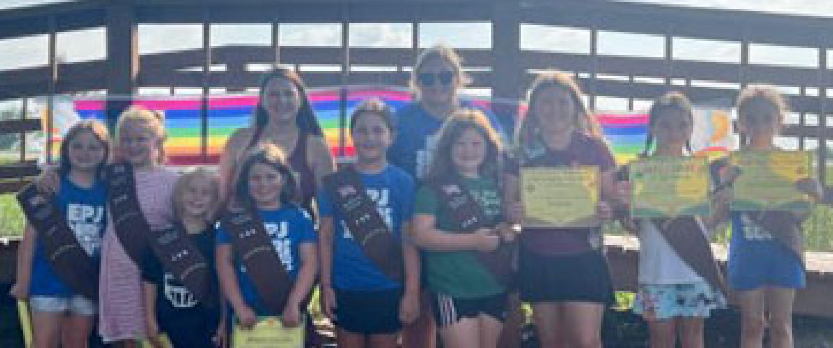Girl Scout Troop 00266 had eight girls move from Daisy to Brownie level. They were, from left, Addison Kuhlmann, Amelia Sundleaf, Harper Rosenbaum, Hadley Limoges, Shay Martina, Jenna Sellers, Brynlee Glover, Agnes Hurlbert and Kyra Finley; and back, Troop Leaders Sara Rosenbaum and Julie Kuhlmann. Submitted photo