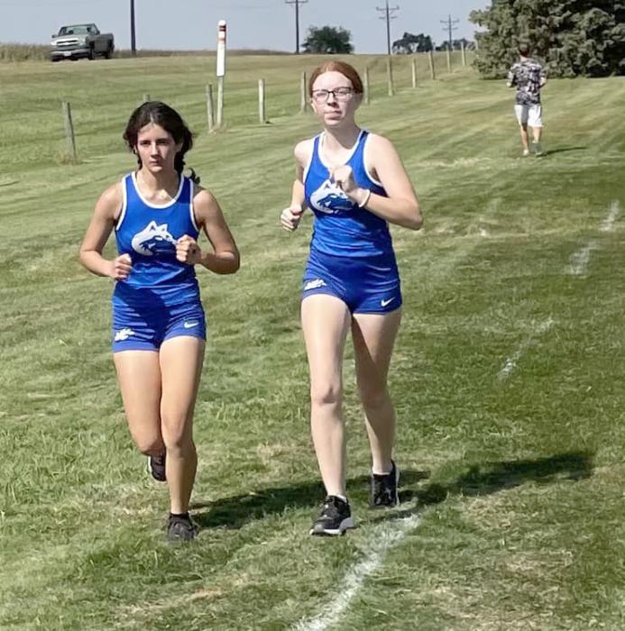 Celeste Curry and Haley Harkness run in the Flyer Invite in Freeman, SD Sept. 13. Submitted photo