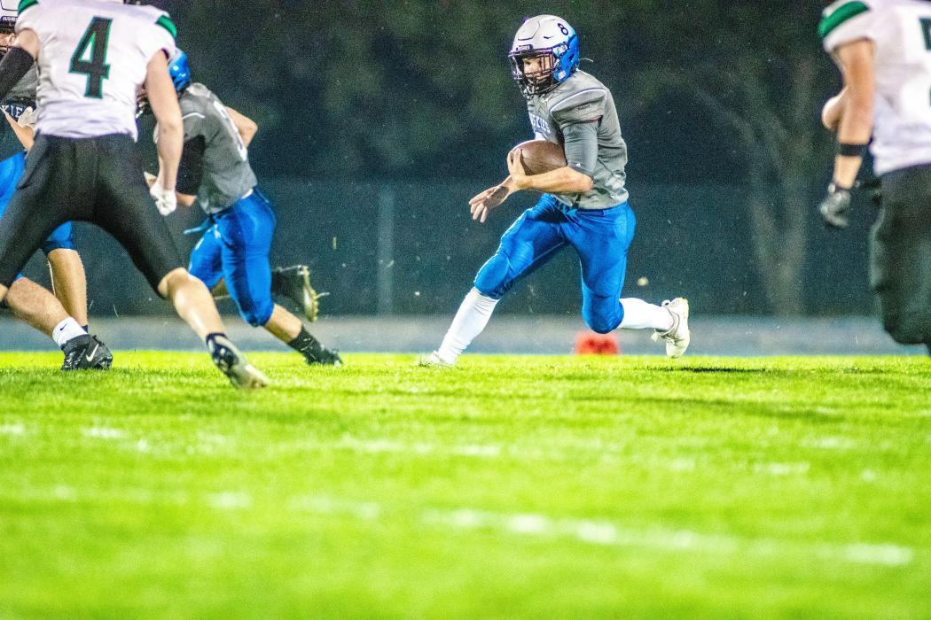 Quarterback Keaton Gale manuevered his way into the endzone against Flandreau. He also threw 2TD passes to Ashton Fairbanks. Photo by Peterman Sports Photography • stevepeterman5@gmail.com