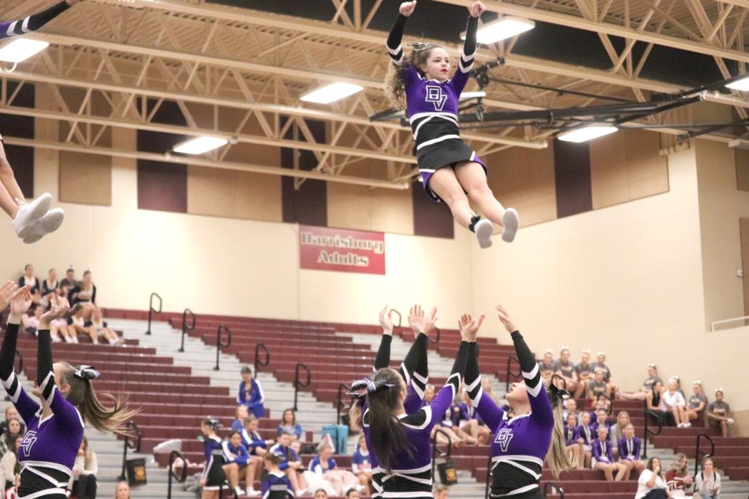 Sophomore Bailey Link is a flyer on the Dakota Valley Competition Cheer team. She’s shown getting tossed in the air at the Harrisburg Invite. Submitted photo