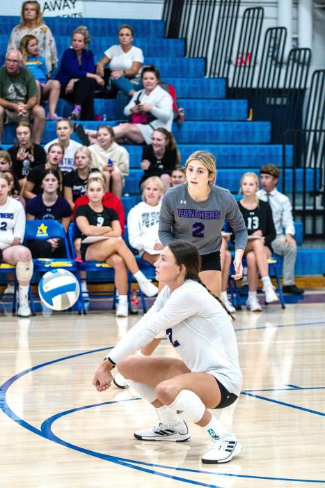 Claire Munch shows focus as she gets a dig for the Panthers. Photos by Peterman Sports Photography • stevepeterman5@gmail.com