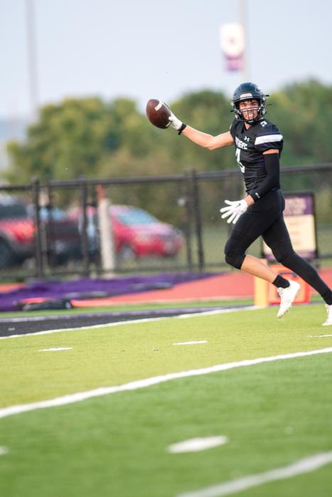 Trae Piel wears a huge smile as he runs the ball into the Panthers endzone for a touchdown during the Homecoming game Sept. 15. Photo by Peterman Sports Photography stevepeterman5@gmail.com