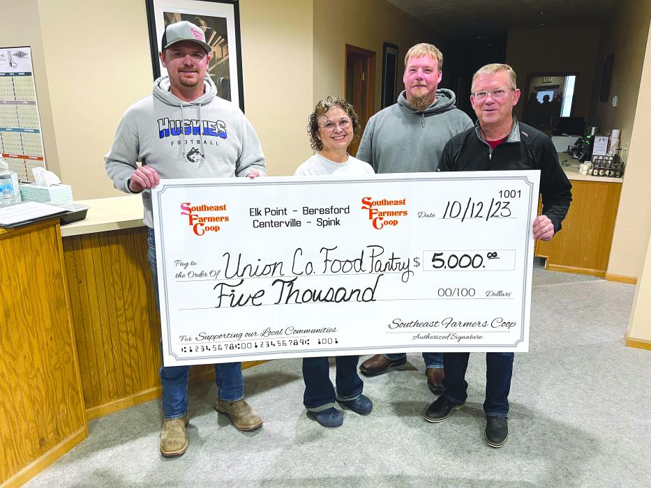 Union County Food Pantry Director Tam Edgar accepted a $5,000 donation from Southeast Farmers Coop. Pictured, from left, are Nick Hammit (Terminal Location Manager), Edgars, Andrew Morris (Terminal Operations Manager) and Merle Lyons (General Manager CEO). Submitted photo