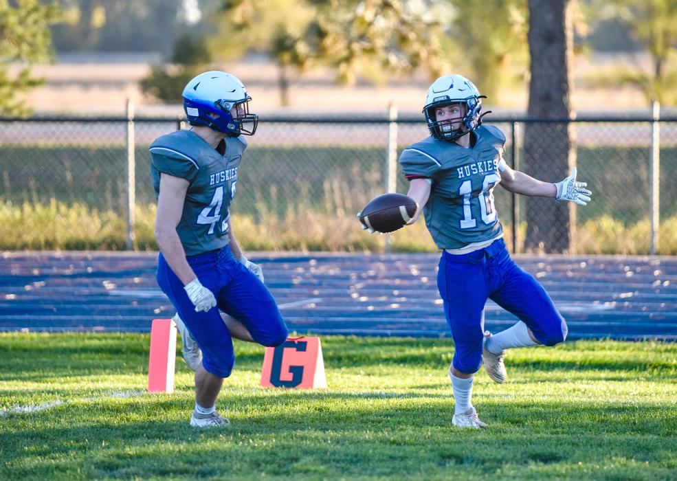 Carson Timmins celebrates a touchdown with teammate Ashton Fairbanks on Oct. 19 against Groton Area. Photos by Peterman Sports Photography • stevepeterman5@gmail.com