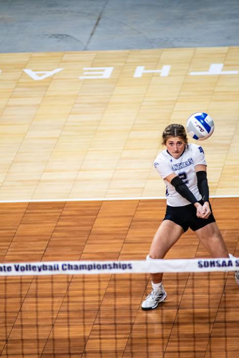 Reagan Granstrom focuses as she passes the ball to the setter during the Class A State Volleyball tournament in Rapid City Nov. 16-18. Photo by Peterman Sports Photography stevepeterman5@gmail.com