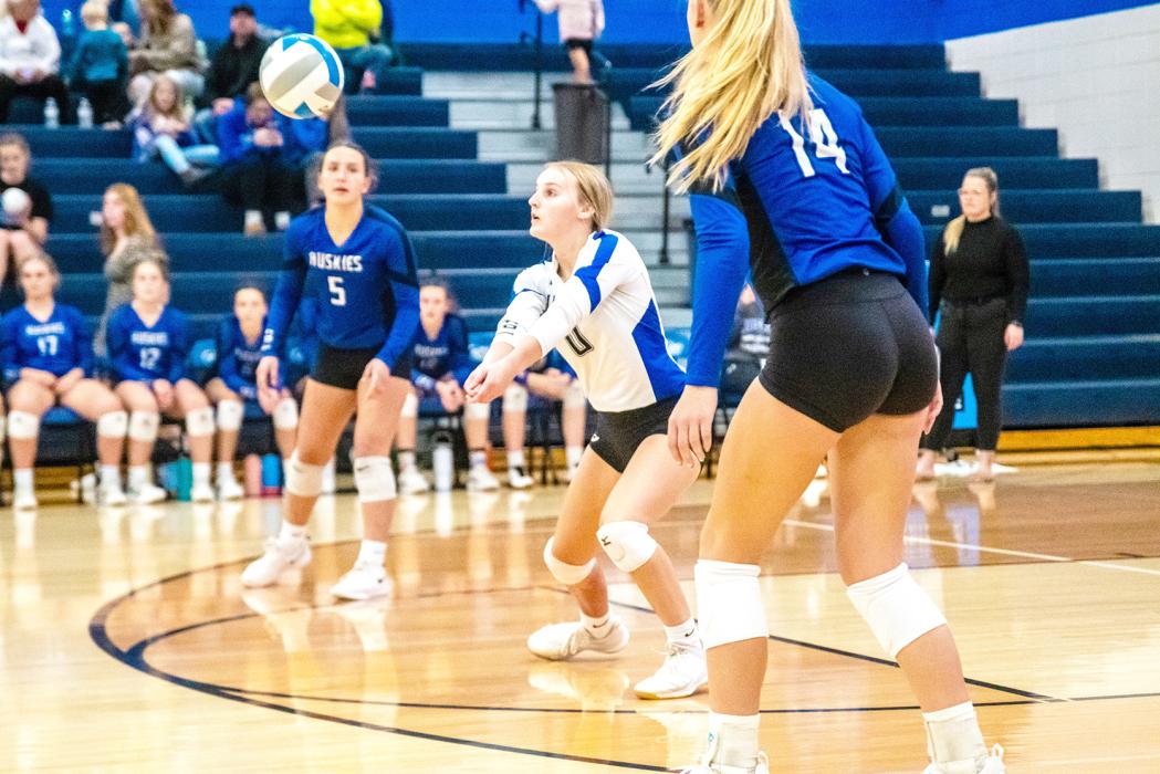  Hannah Nearman passes the ball Oct. 24 as Cera Schmitz and Bentlee Kollbaum look on. Photo by Peterman Sports Photography • stevepeterman5@gmail.com