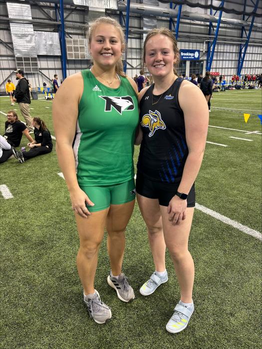Kenna and Josie Curry both play in D1 athletics and competed in their first collegiate competition against one another Dec. 1 and 2 in Brookings, SD. Kenna competes for UND and Josie for SDSU. Submitted photo