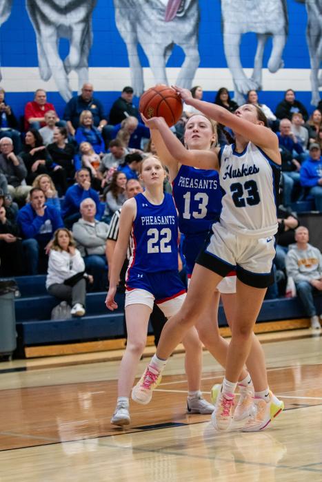 Paige Jacobs goes in for 2 against the Parker Pheasants Dec. 14. She scored 4 points during the game. Photo by Peterman Sports Photography stevepeterman5@gmail.com