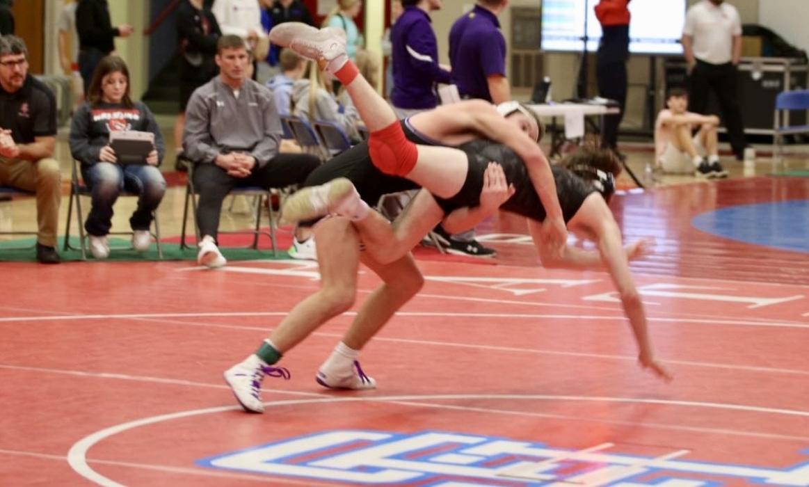 Bennett Lukken makes a move against his opponent during the Floyd Farrand Invite Dec. 30. He brought home a 7th place finish. Submitted photo