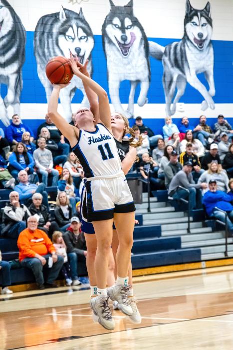 Grace Peed goes up for the jump shot against West Central Jan. 2. She scored 6 points during the game. Photo by Peterman Sports Photography stevepeterman5@gmail.com
