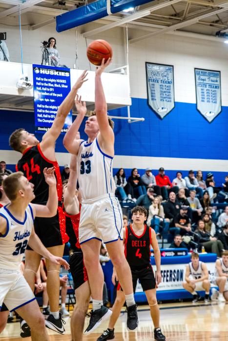 Evan Fornia is a force to be reckoned with under the basket. He scored 13 points against Dell Rapids on Jan. 6. Photo by Peterman Sports Photography stevepeterman5@gmail.com