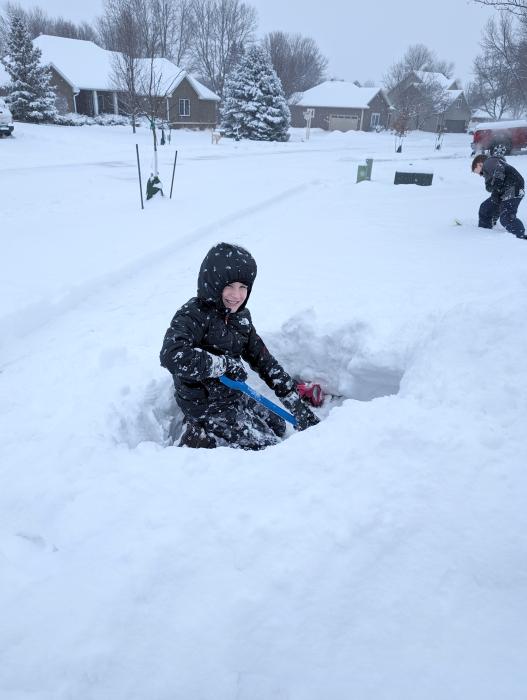 Will Konopasek, a 6th grader at Dakota Valley, builds a snow tunnel in the Dunes on Monday, Jan. 8. It was the first snow day of the 2023-24 school year for the Panthers. Photo by Kelly Riibe • times2reporter@gmaill.com