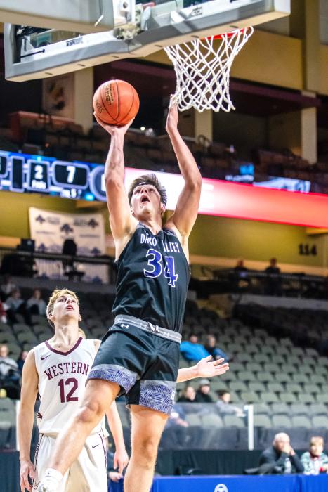 Jaxson “Tish” Wingert uses his height to put points on the board for the Panthers. He had 23 points against Lakota Tech Dec. 22 and 10 rebounds for a double-double. He’s pictured here against Western Christian on Dec. 16. Photo by Peterman Sports Photography stevepeterman5@gmail.com