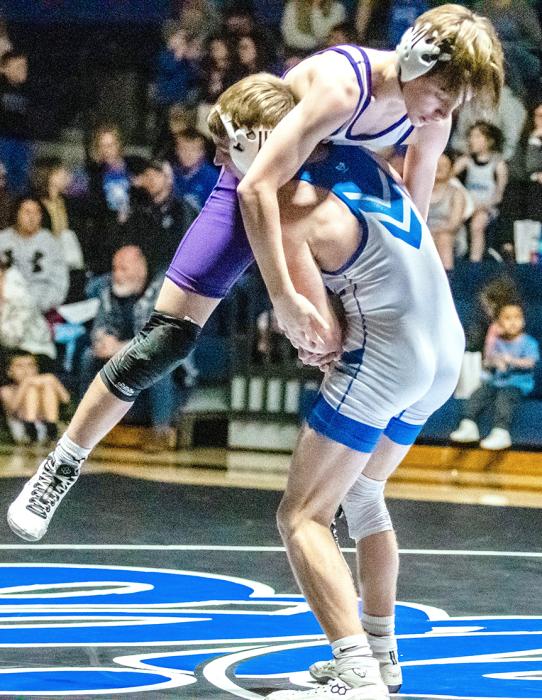 Brody Van Roekel makes a move against Landen Adams of Dakota Valley on Feb. 6 in Elk Point.