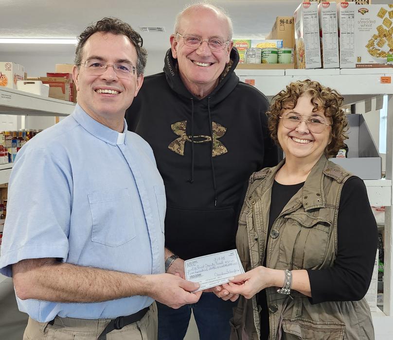 St. Paul Lutheran’s Pastor David Bentz and Church President Scott Bennett presented Elk Point Food Pantry Director Tam Edgar with a check of $500. Submitted photos