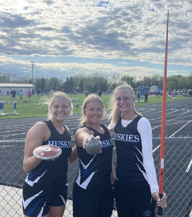 On May 7 at the DAK-XII conference meet Grace Peed, left threw the discus 119-01 to garner first place, Molli Harkin, middle placed first in shot put with a throw of 35-07, and Bentlee Kollbaum, won in the javelin contest. She recorded a throw of 123-02. Submitted photo