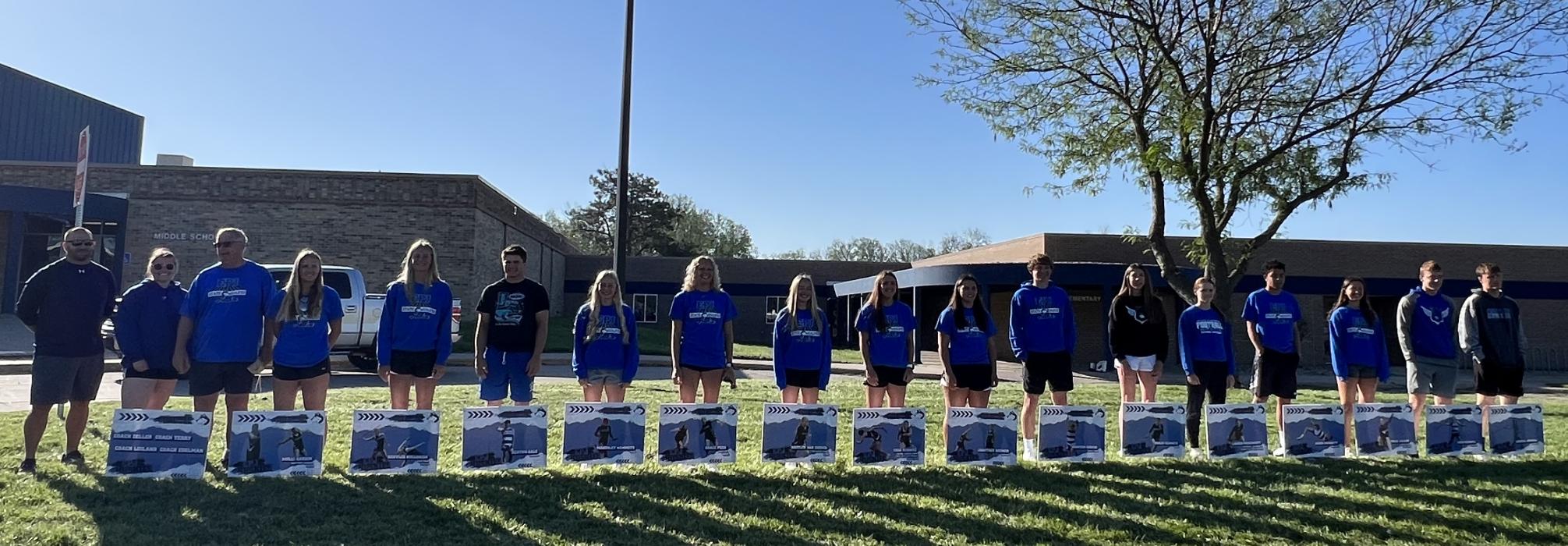 Elk Point-Jefferson State Track qualifiers posing by their signs duing the state send off May 23, 2024. Submitted photo