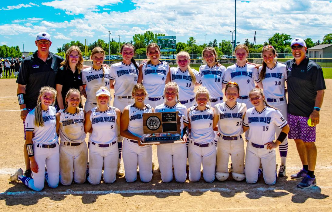 Dakota Valley 2024 Softball Team: Consolation Champions with a 5th Place Finish at State. Back row from left: Assistant Coach Jason Anderson, Madison Bell, Brennan Trotter, Madie Munch, Chaley Preston, Ellison Rose, Payten Konopasek, Paige Moffatt, Annie Bourne, and Head Coach T.C. Weinandt. Front row from left: Lexie Stusse, Bria Perryman, Ella Schmiedt, Avry Trotter, Ashlynn Stusse, Addison Dickson, Mia Riibe, and Emma Barnett.