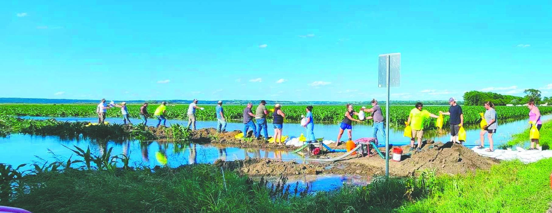 Jefferson residents and volunteers created a berm from sandbags to try and keep water out of city limits. Submited photo