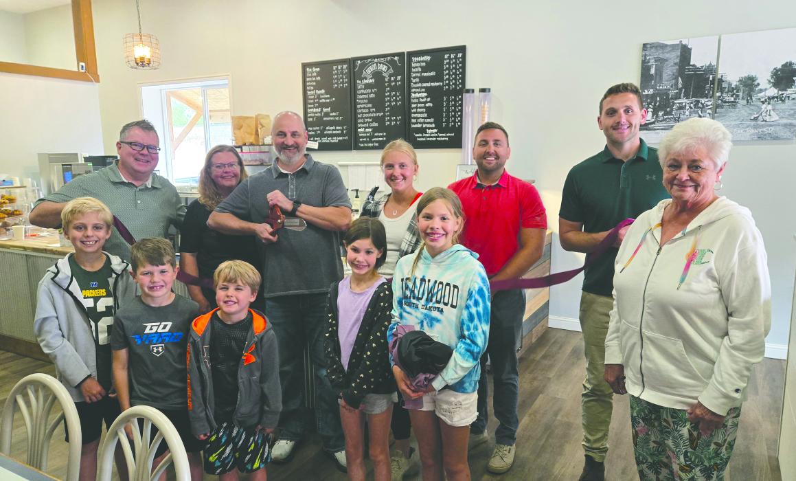Union Bean owners, family and chamber members celebrate the Chamber ribbon cutting June 17, 2024. Submitted photo