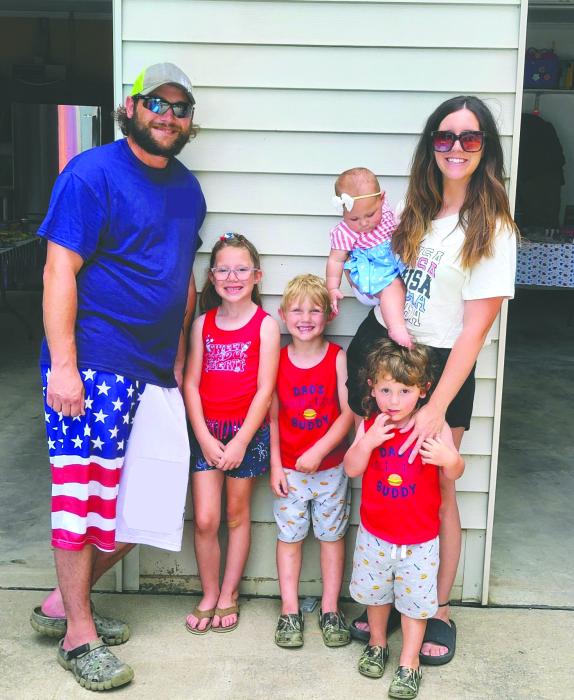 Marica Meins, of Elk Point, can be seen here in this photo with her husband Justin and children all dressed in patriotic attire. Meins is an elementary teacher at EPJ. Submitted photo
