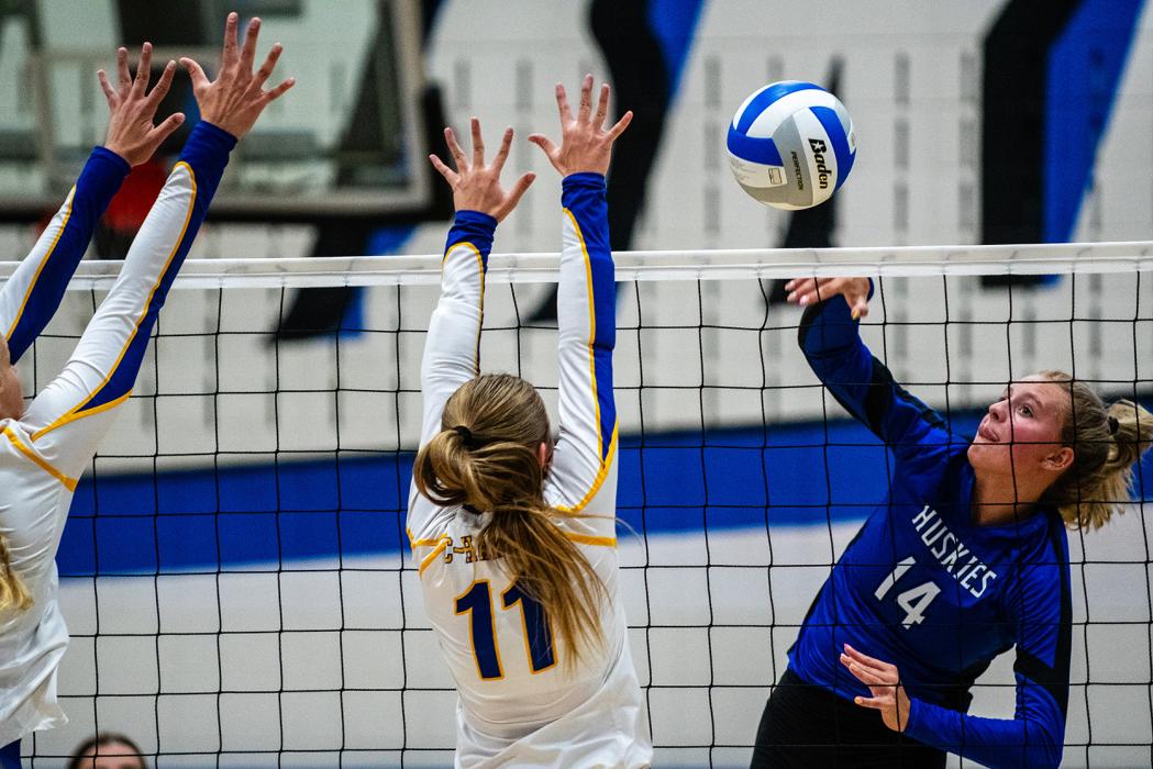 Bentlee Kollbaum, senior #14 for EPJ, hits a kill for her team against Canton. Photos by Peterman Sports Photography • stevepeterman5@gmail.com