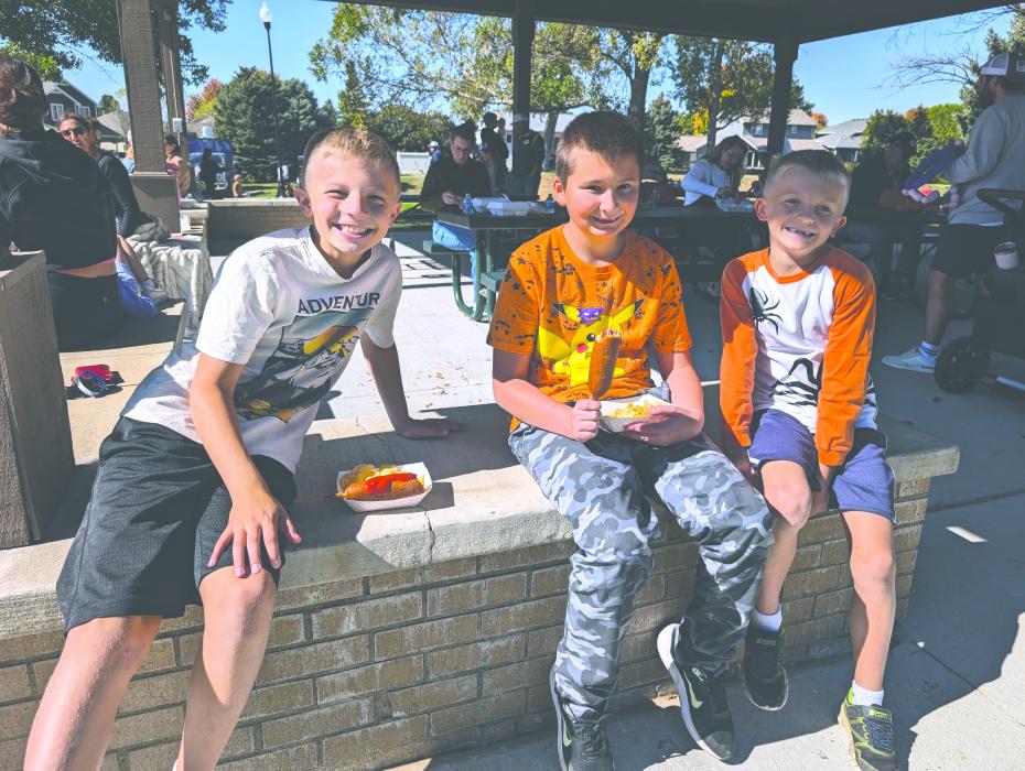 Many enjoyed the food truck cuisine and beautiful weather at the Dakota Dunes Fall Festival on Sunday, October 6th. These three boys tried the corn dogs, some if which were drizzled with honey. From left: Dominic Chochon, Gabe Bourne, and Aiden Chochon.