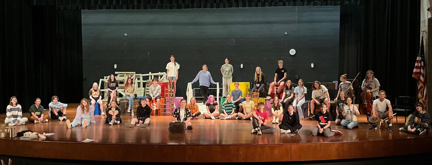The cast and crew gather on the stage to rehearse the DV’s 3-act play. Submitted photos