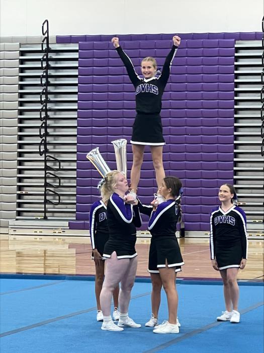 Samantha Nelson gets lifted by her Panther competition cheer teammates on Saturday, October 12th.