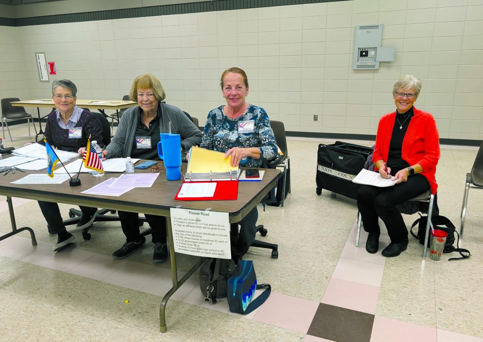 Election officials, for Precinct 10, in North Sioux City assisted voters at the fire department on Nov. 5, 2024. From left: Joan Christiansen, Judith Bailey, Sherry Caba, and Cris Berger. 										 Photo by Kelly Riibe • times2reporter@gmail.com