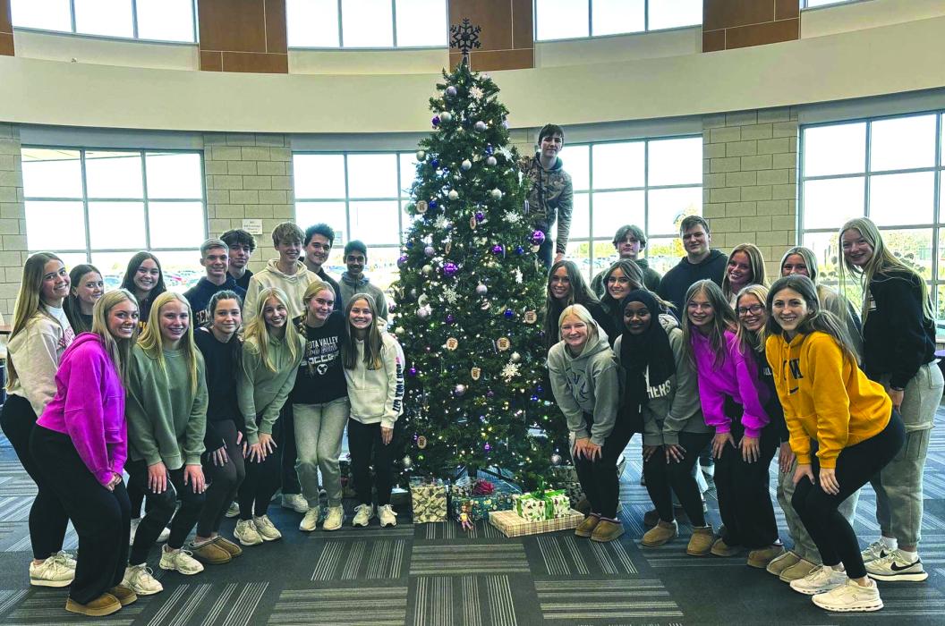 Members of the DV high school student council gathered around the school’s giving tree on Tuesday, Nov. 26, 2024. Submitted photo