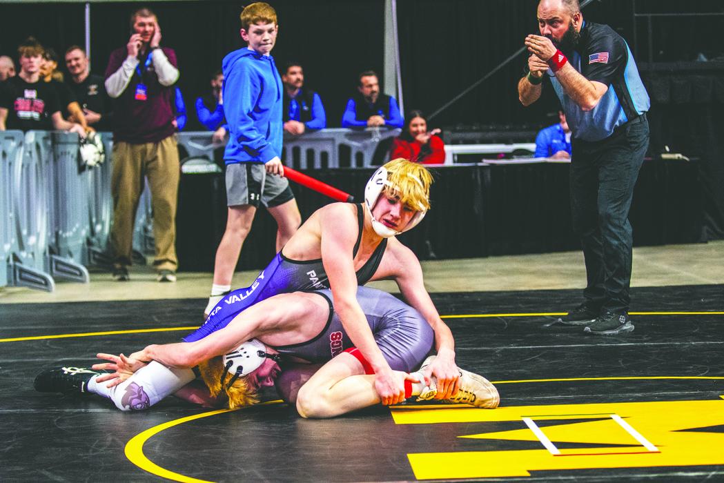 Braedy Sievers, in the 120 pound weight bracket, battled Micah Stern of Brookings.