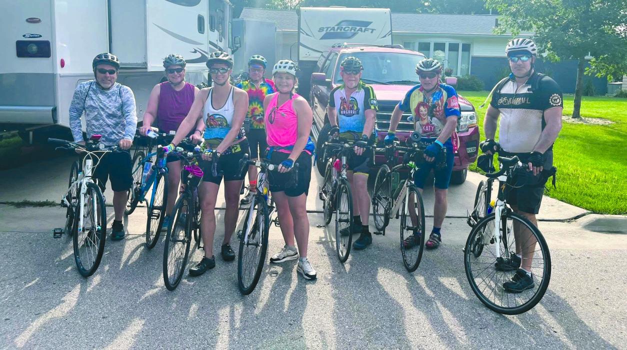 Greg and Kelly George, of Elk Point, rode in RAGBRAI 2025 with Amanda and Jeremy Vande Zande of Jefferson. The two couples were with a group of other bicyclists from Iowa and Wisconsin. This photo was taken in Cedar Falls, IA which was the starting point for Day 6 of 7 on the route. From left: Kelly George is 4th from the left, Amanda Vande Zande is 5th from the left. Greg George is 7th from the left. Jeremy Vande Zande is on the far right of the photo. Submitted photo