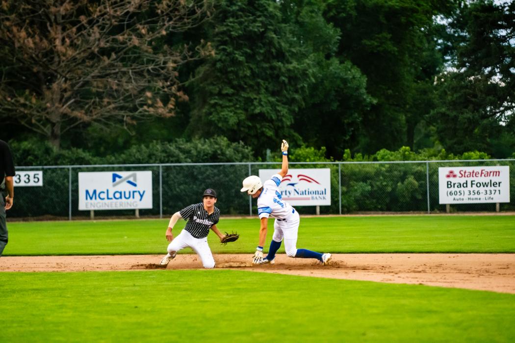 Grayson Girard makes it to 2nd base for the steal versus Dakota Valley on July 16th. Photo by Peterman Sports Photography • stevepeterman5@gmail.com