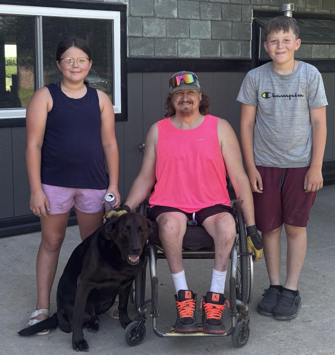 Rawsen and Kobryn Vogt have been helping with lawn care this summer as a part of the 50Yard Challenge. The two are seen here in this picture with Ross Ries. Submitted photo