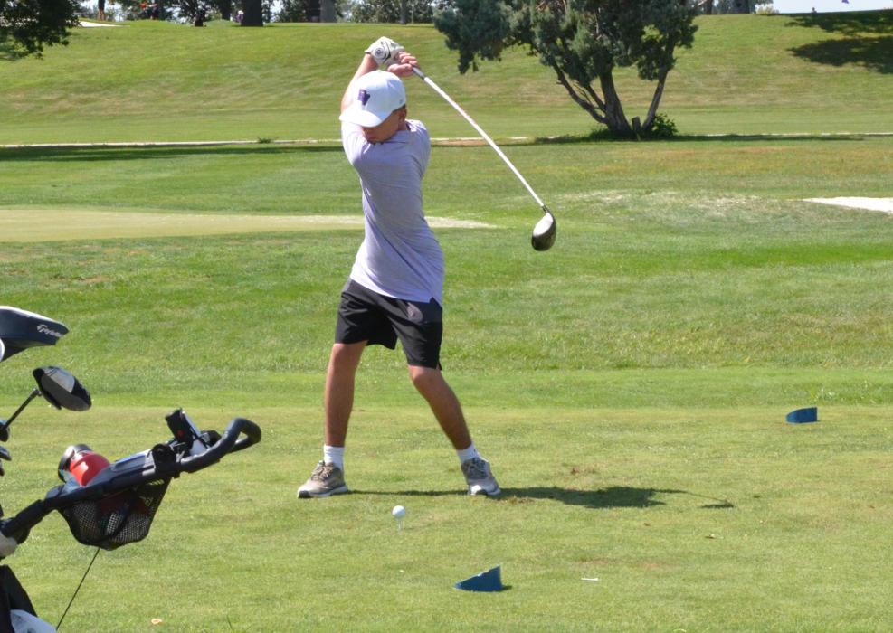 Sophomore Atticus Slater hits a nice shot while golfing in the Panther Invite in Dakota Dunes.