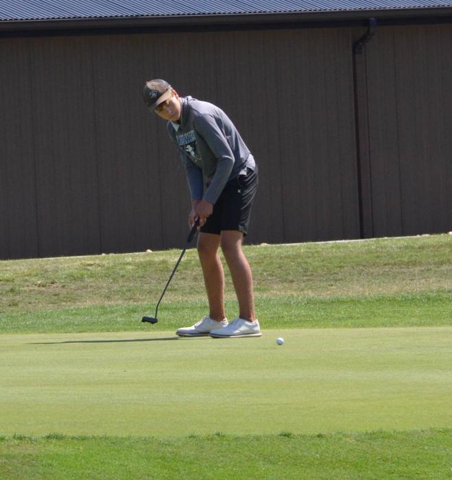 Spencer Marx lines up his putt during EPJ’s golf meet at Two Rivers Golf Club in Dakota Dunes. Photo by Kelly Riibe • times2reporter@gmail.com