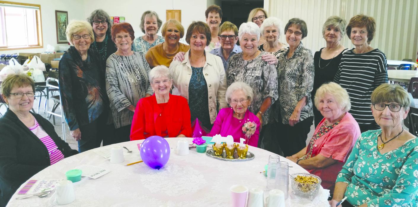 Woman’s Wednesday Club members surround Gladys Hanson celebrating her 100th birthday October 5. Seated from left: Sondra Stickney, Carolyn Jones, Gladys Hanson, Judy Quam and Patty Skinner. Middle row from left: Maxine Bird, Audrey Williams, Carmen Wilcox, Gaylene Guimond, Linda Roggow, JoAnn Vinzant, Kristie Quam, Caroline Harkness and Rhonda Kooiman. Back row from left: Gwen Stickney, Danielle Wilkinson, Cindy Schwier and Lori Hawley. Submitted photo
