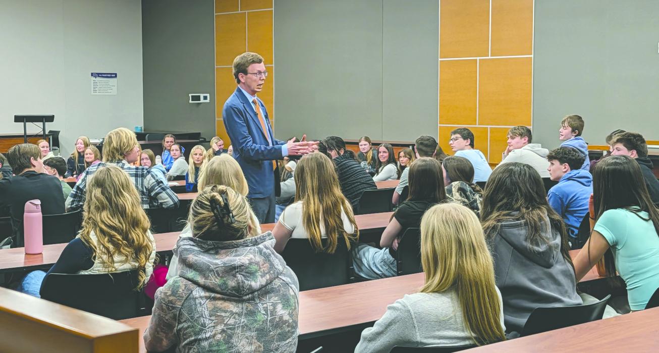 South Dakota Congressman Dusty Johnson speaks with Dakota Valley High School students during a question‑and‑answer session on Feb. 18, 2026, in the Panther theater room. About 75 students, including the full student council, attended the hour‑long discussion. Photo by Kelly Riibe • times2reporter@gmail.com