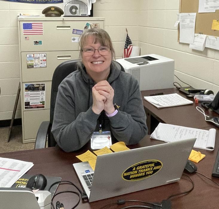 Lisa Schenzel sits in the Veterans Service Office at the Union County Courthouse, where she assists local veterans with accessing benefits. Submitted photo