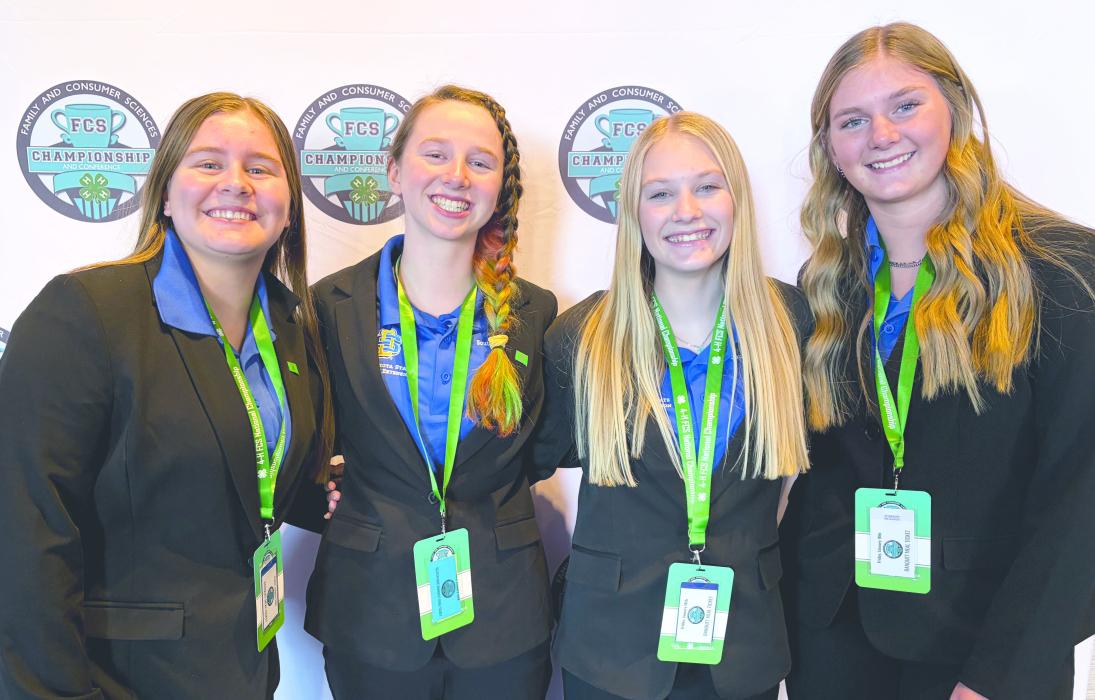 Regan Rasmussen, far left, is pictured with teammates Lydia Helkenn of Beadle County, Lillie Boden of Lincoln County and Lexy Faulhaber of Aurora County. Submitted photo