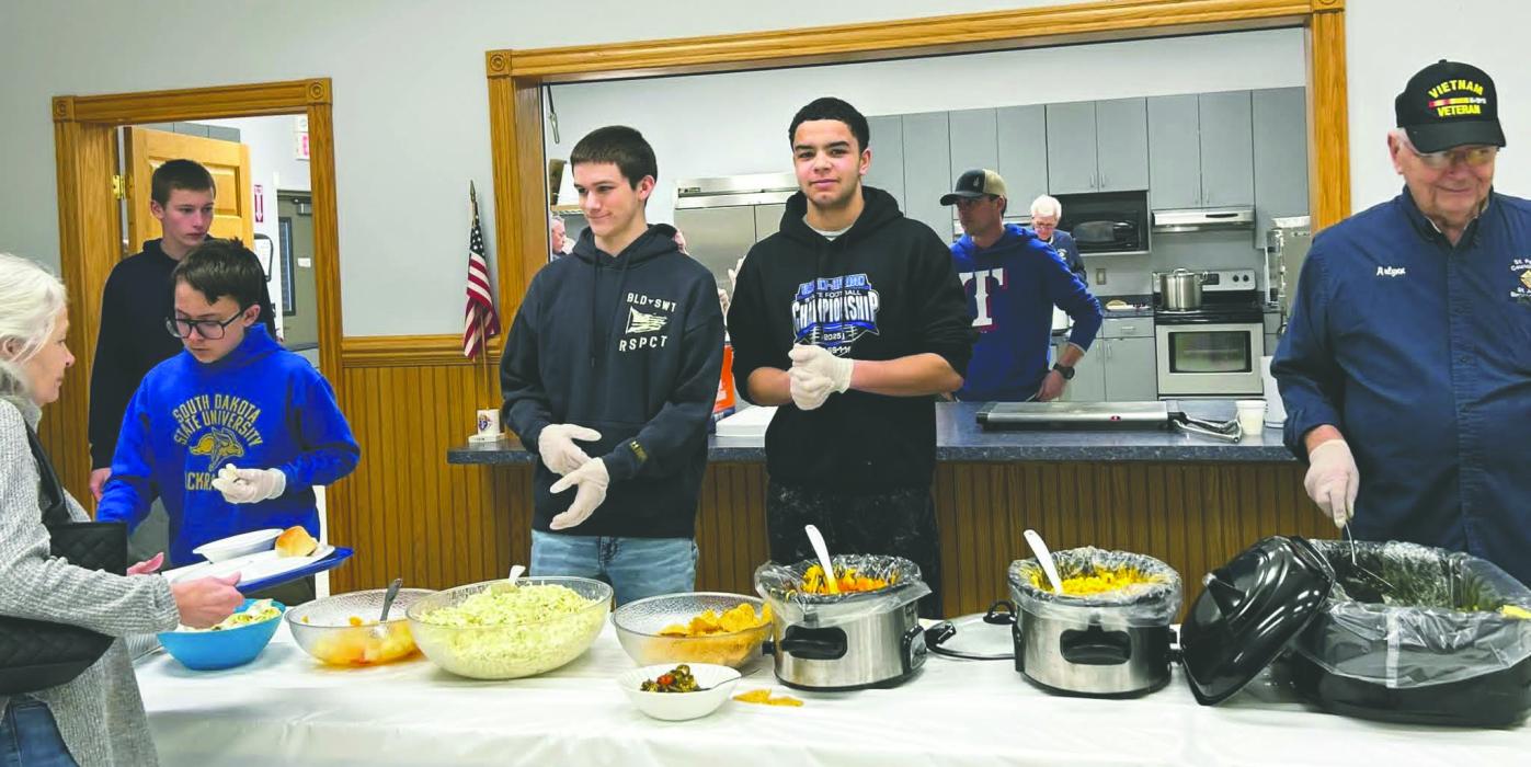 The Knights of Columbus hosted a fish fry on March 6, 2026 at St. Joseph’s in Elk Point. Youth parishioners from Elk Point-Jefferson assisted with serving and cleaning up for the well attended feast.  Serving line from left: Owen Boyle, Henry Walery, Nick Prouty, Aiden Hammitt, Marc Walery (in kitchen area) and Arlynn Schmidt. 
