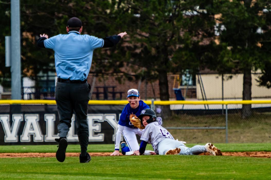 Tyler Kloucek slides in, and is safe, at 2nd base during the Panther’s game versus Canton. Photo by Peterman Sports Photography • stevepeterman5@gmail.com