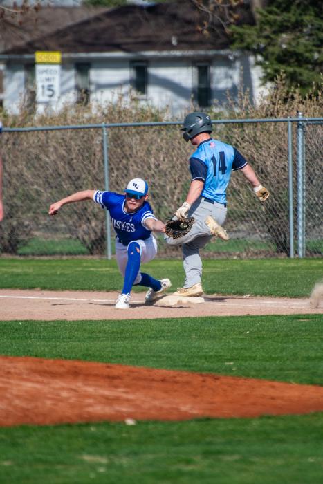 Nick Prouty stretches for the ball during EPJ’s game on April 12th. Photo by Peterman Sports Photography • stevepeterman5@gmail.com