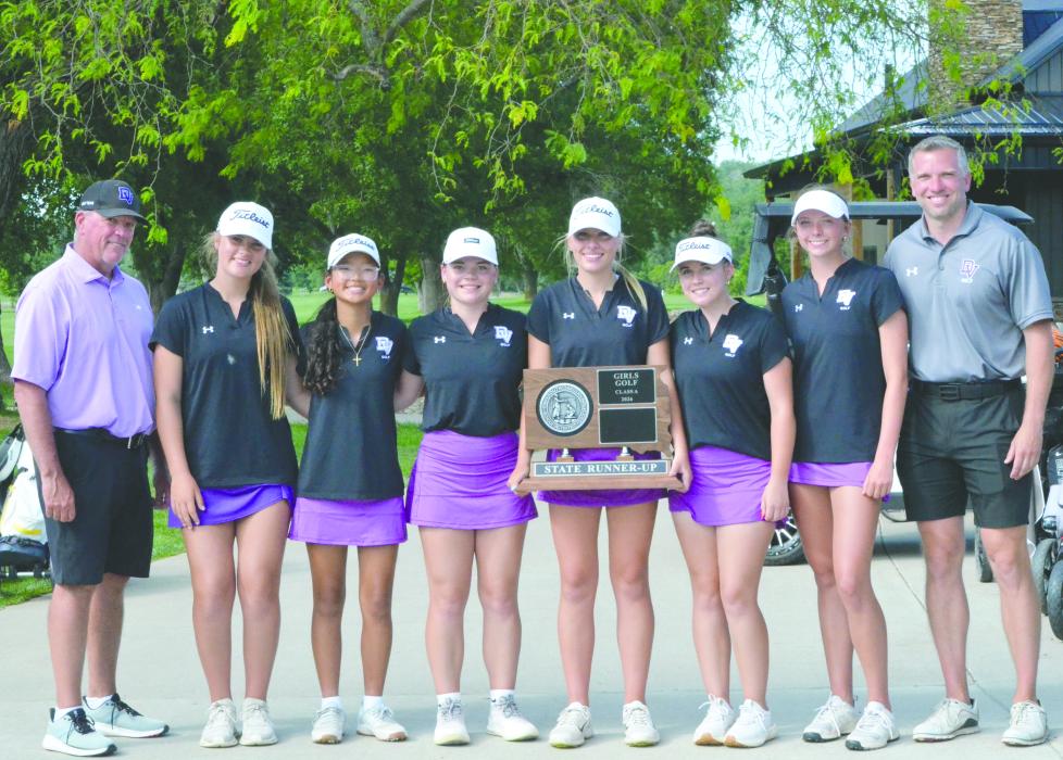 The Dakota Valley girls golf team was crowned Class A runner-up on June 2, 2026 at the state meet. From left: Coach Rodd Slater, Remy Probasco, Nichole Yang, Claire Weibelhaus, Katie Betsworth, Addicyn Sailer, Skylar Anderson and Assistant Coach Jacob Sittig.     								     